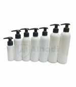 White pump bottles with golden / silver lid